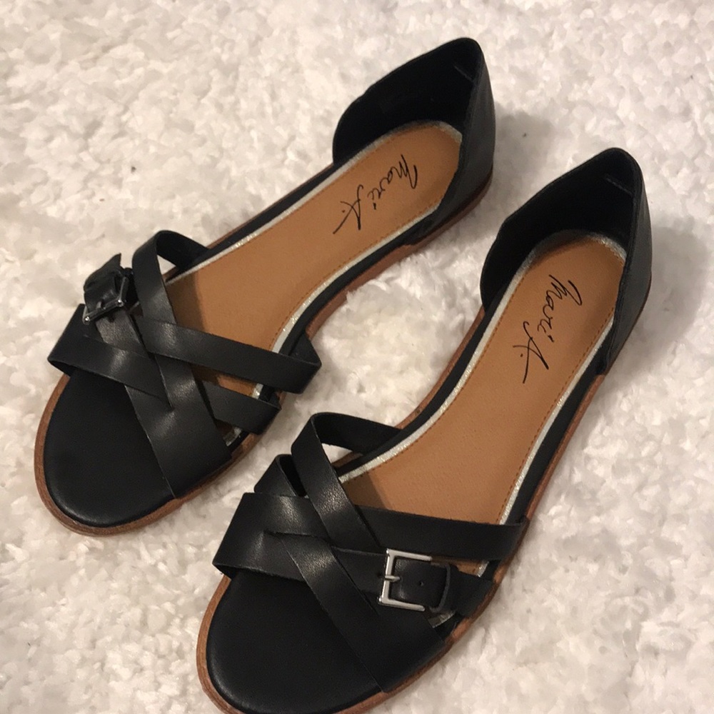 Mari A. Flats - Picture 2 of 5
